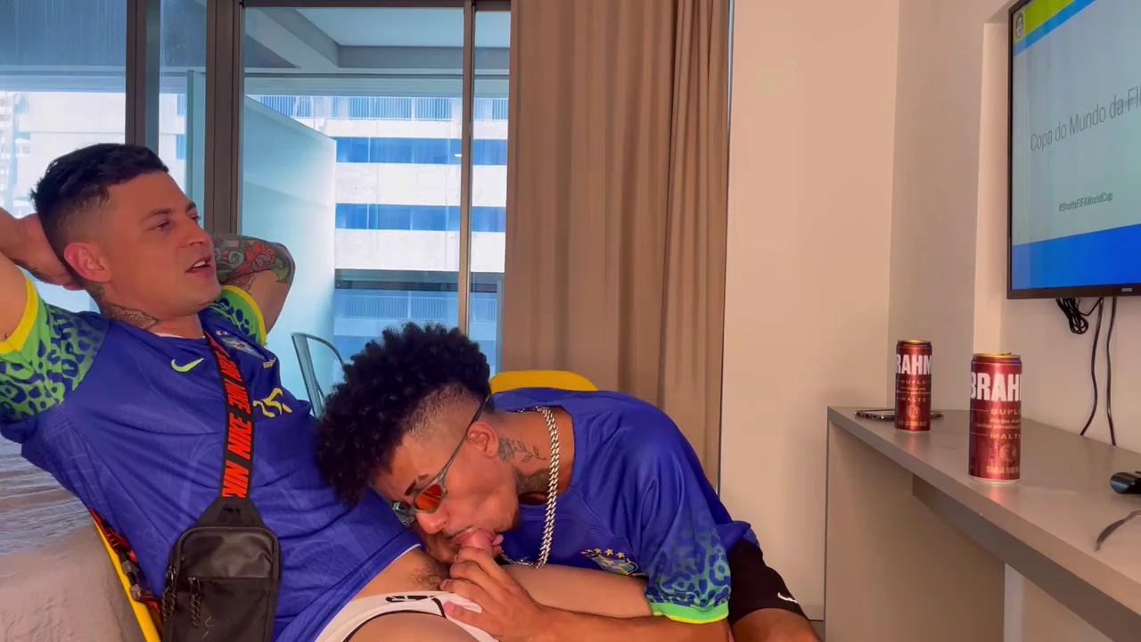 Bruno Sarado and his friend João celebrate Brazil’s victory